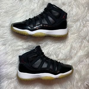 black and yellow jordans 11